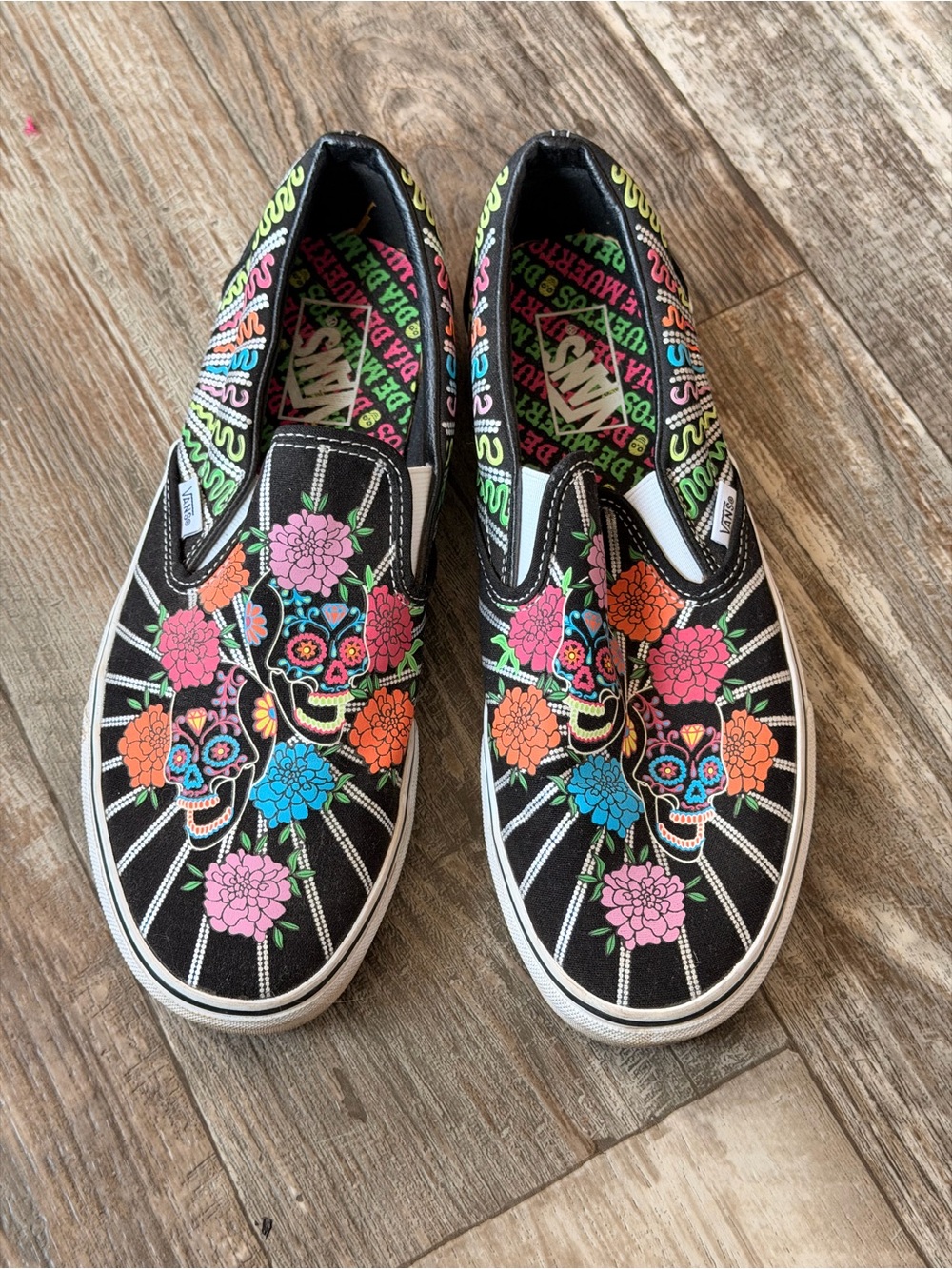 Vans Black Slip-On Sneakers with Neon Floral Sugar Skull Print-glow in dark